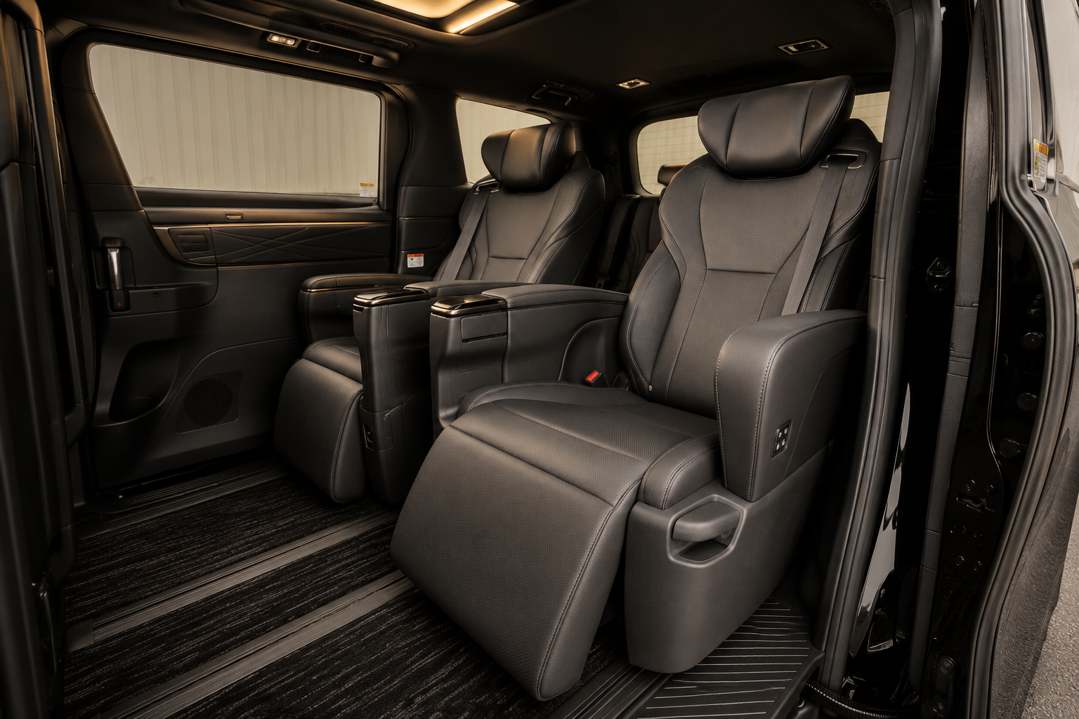 Luxurious second-row Premium Pilot Seats inside a Toyota Alphard